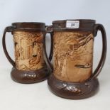 A pair of Art Nouveau style Bretby twin-handed vases decorated oriental scenes, model no. 1953,