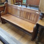 A church pine pew, 151 cm wide