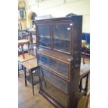 A Globe Wernicke style oak four section bookcase, 87 cm wide