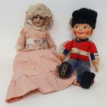 A small Simon & Halbig bisque head doll, impressed DEP S & H Germany, 22 cm, and a Norah Wellings,