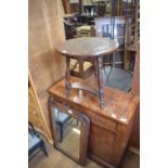 A burr elm side cabinet, 76 cm wide, a carved oak low table, a mirror, a pair of dining chairs, a