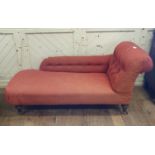 An upholstered chaise longue, on turned legs Report by RB One leg stamped Holland & Son, although
