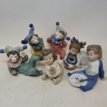 A set of six Nao figures, of children in various poses, with boxes (6)
