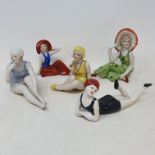 A porcelain lady, in a swim suit, 7.5 cm high, and four others similar (5) Report by RB Modern