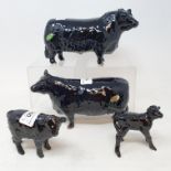 A Beswick Aberdeen Angus bull, 1562, an Aberdeen Angus cow, 1563, an Aberdeen Angus calf, 1406A,