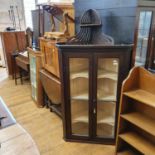 A two door hanging corner cupboard, 82 cm wide, a boot jack, a dressing mirror, a stool, a