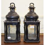 A pair of black painted hanging lanterns, 41 cm high (2)