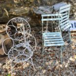 A set of four folding garden chairs, a similar pair, another chair, a marble top garden table, and