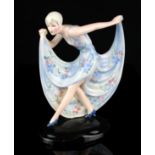 Lorenzl for Goldscheider ? an Art Deco figure of a female dancer in blue floral dress, model no.