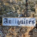 An ANTIQUITES shop box light sign, a wrought iron bracket, petrol cans and other items (qty)