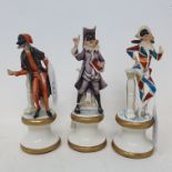 Three Capo di monte Commedia Dell?Arte figures of Pulcinella, Pantalone and Harlequin, each stood on