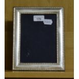 A silver mounted photograph frame, 23.5 x 18 cm Report by RB Modern