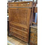 A Louis XV style secretaire a abattant, having a drawer above a fall front, with three long