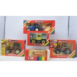 A collection of Britains tractors and agricultural machinery, all boxed, to include 9577, 9518,