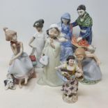 A Rye Pottery 2000 group, The Nativity, 27 cm high, a Lladro group, three others similar, another