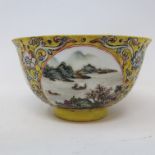 A Chinese porcelain medallion bowl, decorated vignettes of mountain scenes on a yelllow ground