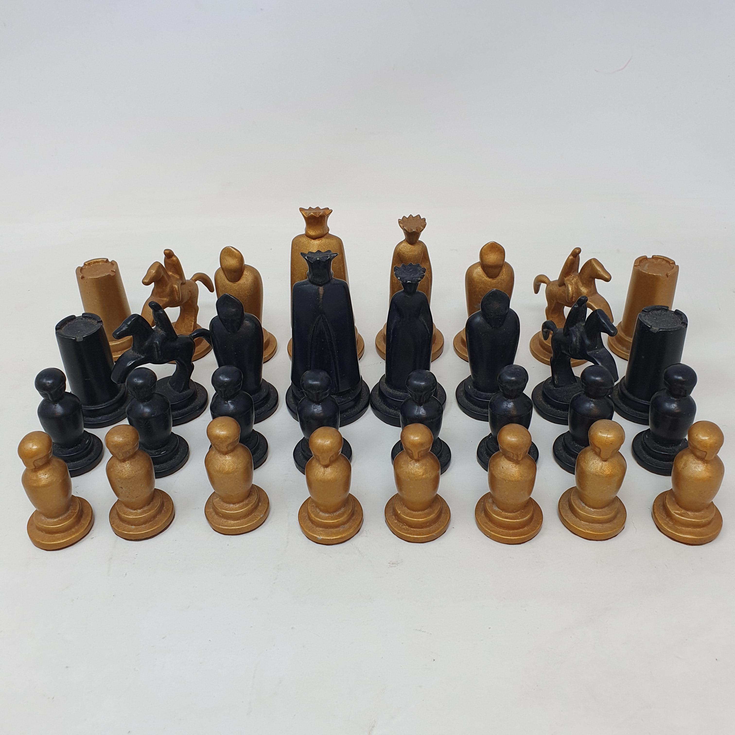 A Modernist chess set, by repute cast from aluminium/duralumin from a Spitfire, the king 8.5 cm high