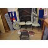 An iron fire basket, three Victorian ebonised bedroom chairs, a brass tray on stand, and four