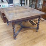 An oak draw leaf table, on barley twist legs, 214 cm wide (extended)