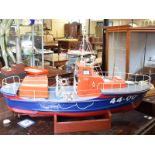 A scale model, of a lifeboat, 44-00, 110 cm, on a stand
