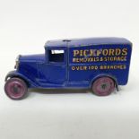 A Dinky Toys delivery van, Pickfords, 28b, with a radiator surround, cast hubs and Hornby Series