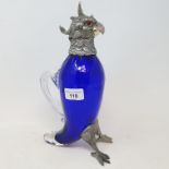 A blue glass decanter, in the form of a parrot, with plated mounts, 28 cm high Report by RB Modern