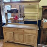 An oak dresser, requiring finishing, 170 cm high