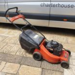 A Lawn-King petrol lawn mower, and a Mitox 261L petrol strimmer (2)