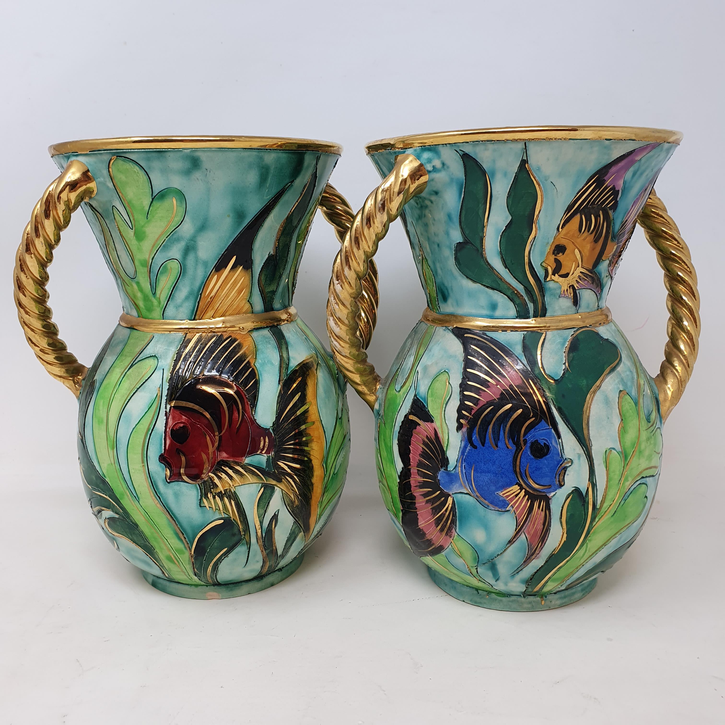 A pair of Vallauris French art pottery twin-handled vases, decorated with exotic fish amongst - Image 2 of 3