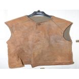 A WWII era military type issue leather gilet, assorted booklets, railway timetables and other