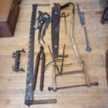 A two handled saw, other saws, tools and bygones (qty)