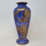 A Wedgwood dragon lustre vase, mottle blue ground decorated with celestial dragon and sacred
