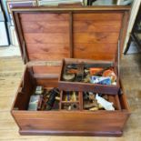 A carpenter's chest and various tools