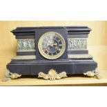 An early 20th century polished slate mantel clock, with gilt metal mounts, dial with visible
