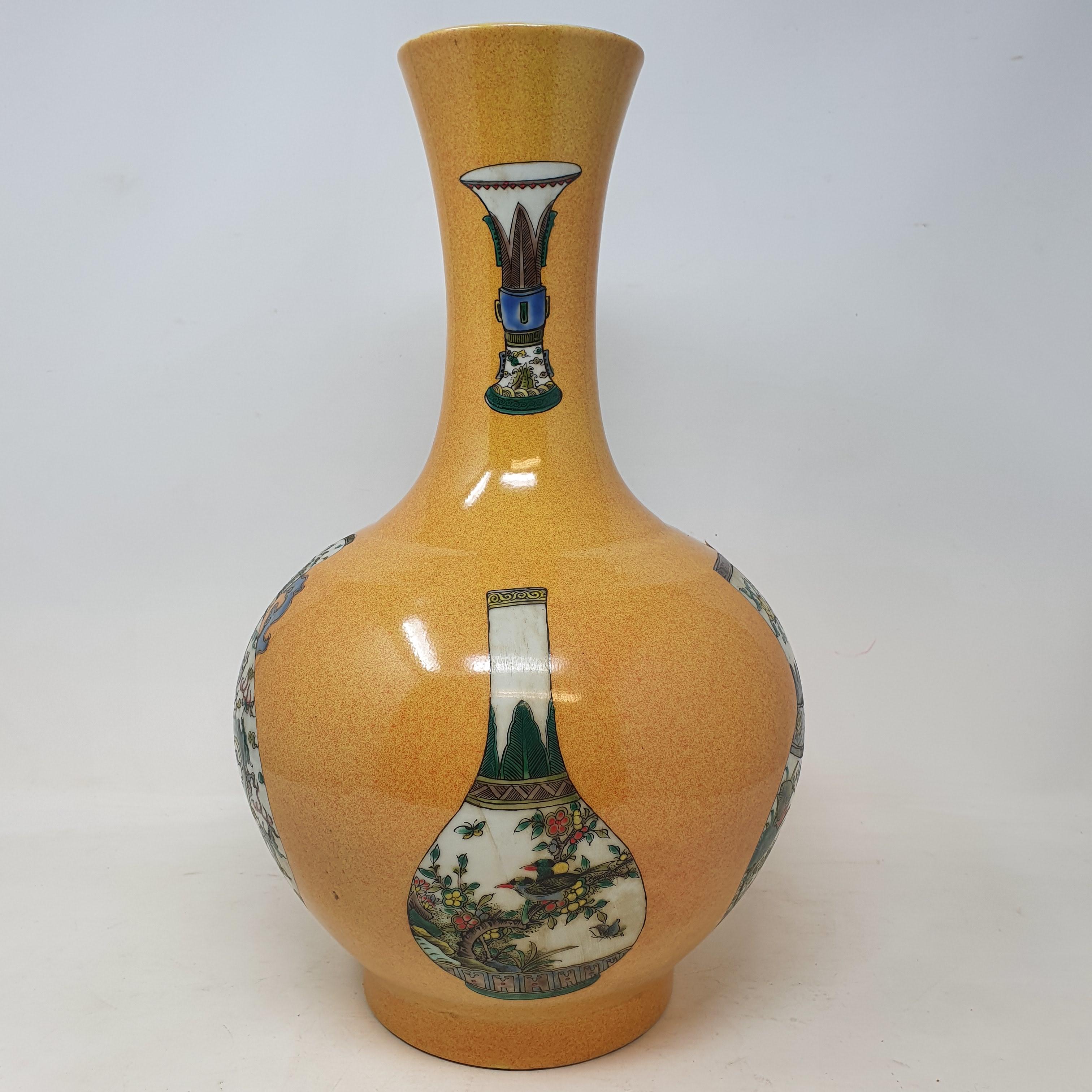 A Chinese famille verte vase, of baluster form, decorated vases, 37.5 cm high Report by RB Modern - Image 3 of 6