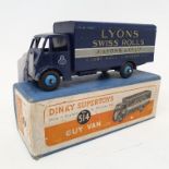 A Dinky Supertoys Guy lorry, Lyons Swiss Rolls, 514, boxed Report by RB Has been lying on its side