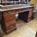 A late Victorian pedestal desk, 137 cm wide