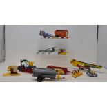 A collection of Britains tractors and agricultural machinery, all boxed, to include 43215, 0038,