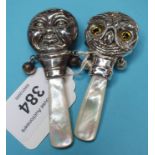 A novelty silver owl rattle, with a mother of pearl handle, and another similar (2)