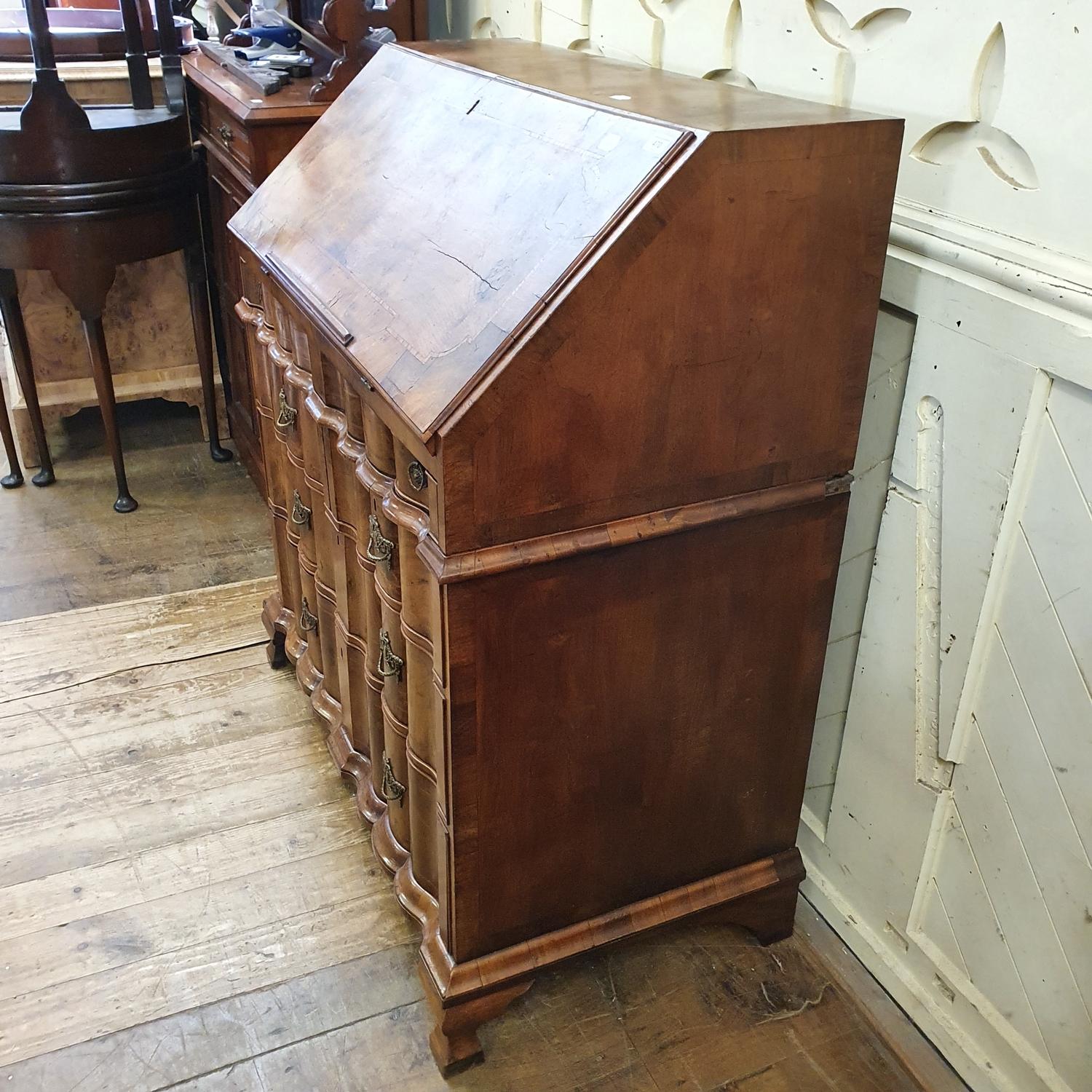An 18th century Continental walnut bureau, the fall front revealing a fitted interior and a well, - Bild 4 aus 8