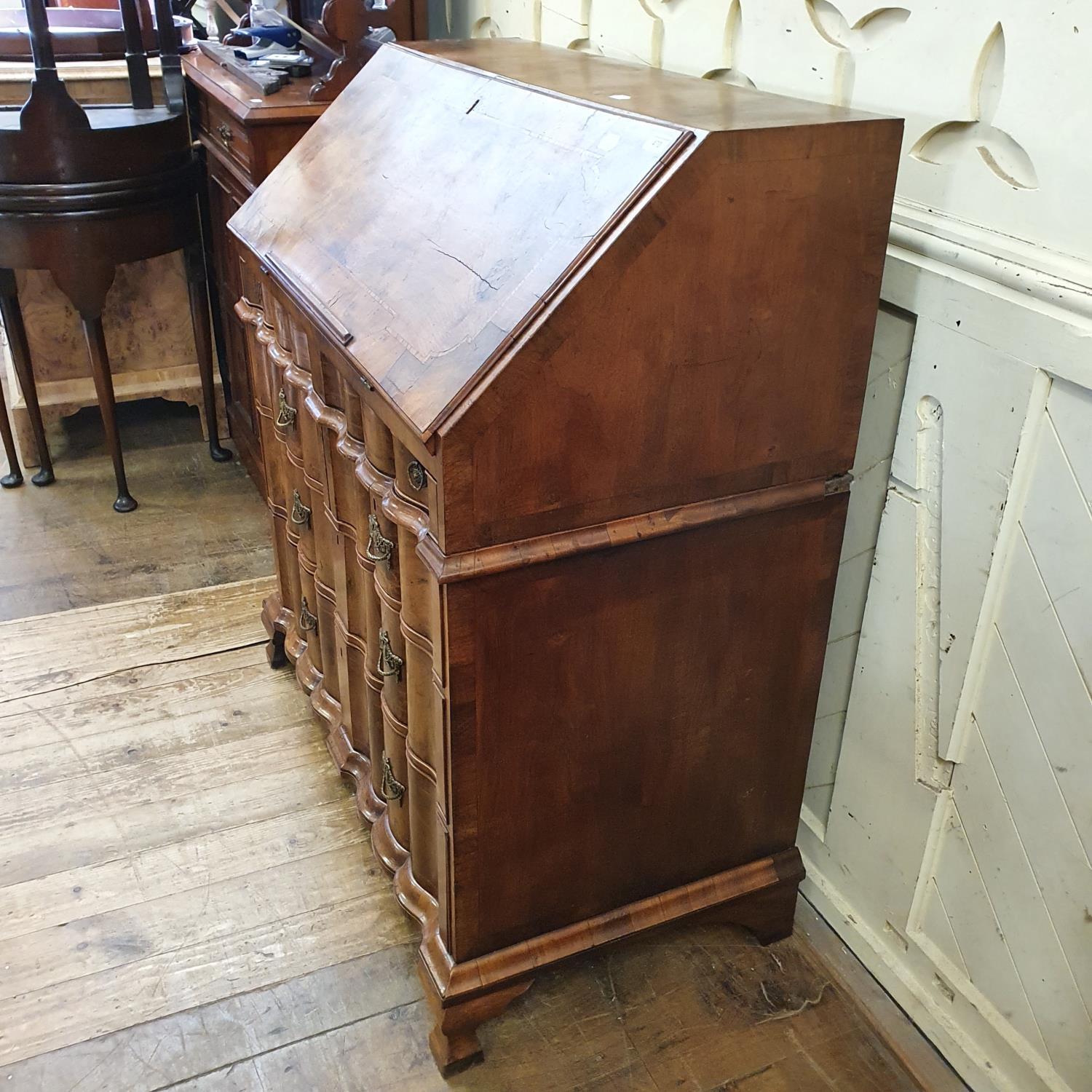 An 18th century Continental walnut bureau, the fall front revealing a fitted interior and a well, - Bild 3 aus 8