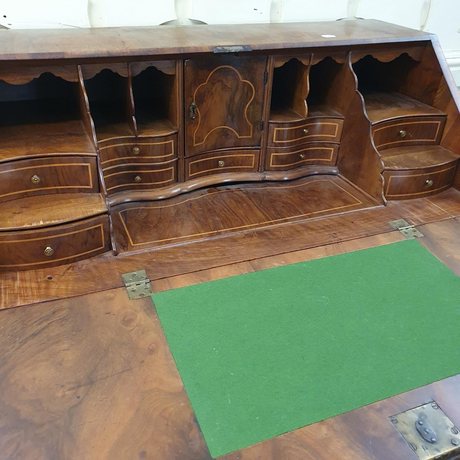 An 18th century Continental walnut bureau, the fall front revealing a fitted interior and a well, - Bild 7 aus 8