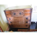 A 19th century mahogany chest, having an arrangement of five short and three graduated long drawers,