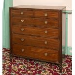 A 19th century mahogany chest, of two short and four graduated long drawers, flanked by reeded