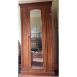 A Victorian mahogany wardrobe, with a mirrored door, 114 cm wide, removal cost D Report by RB A