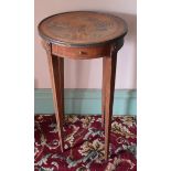 A French occasional table, the top inlaid a lady with a castle in the distance, above a frieze