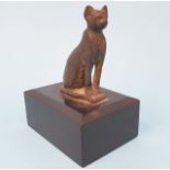 A bronze Egyptian style cat, 6 cm high, on marble base