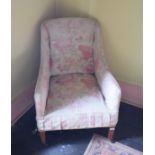 An Edwardian upholstered armchair, on tapering square legs, removal cost B