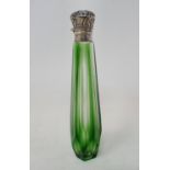 A green glass scent bottle, with silver coloured metal mounts, 12 cm Report by JS Overall
