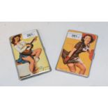A pin up girl cigarette case, and another similar (2) Report by RB Modern